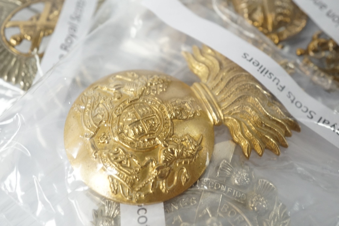 Eighteen Scottish and the Borders cap badges and Glengarry badges, including; Royal Scot Fusiliers, 96th Regiment of Foot, the Black Watch, Cameron Highlanders, Argyle and Sutherland Highlanders, Highland Light Infantry